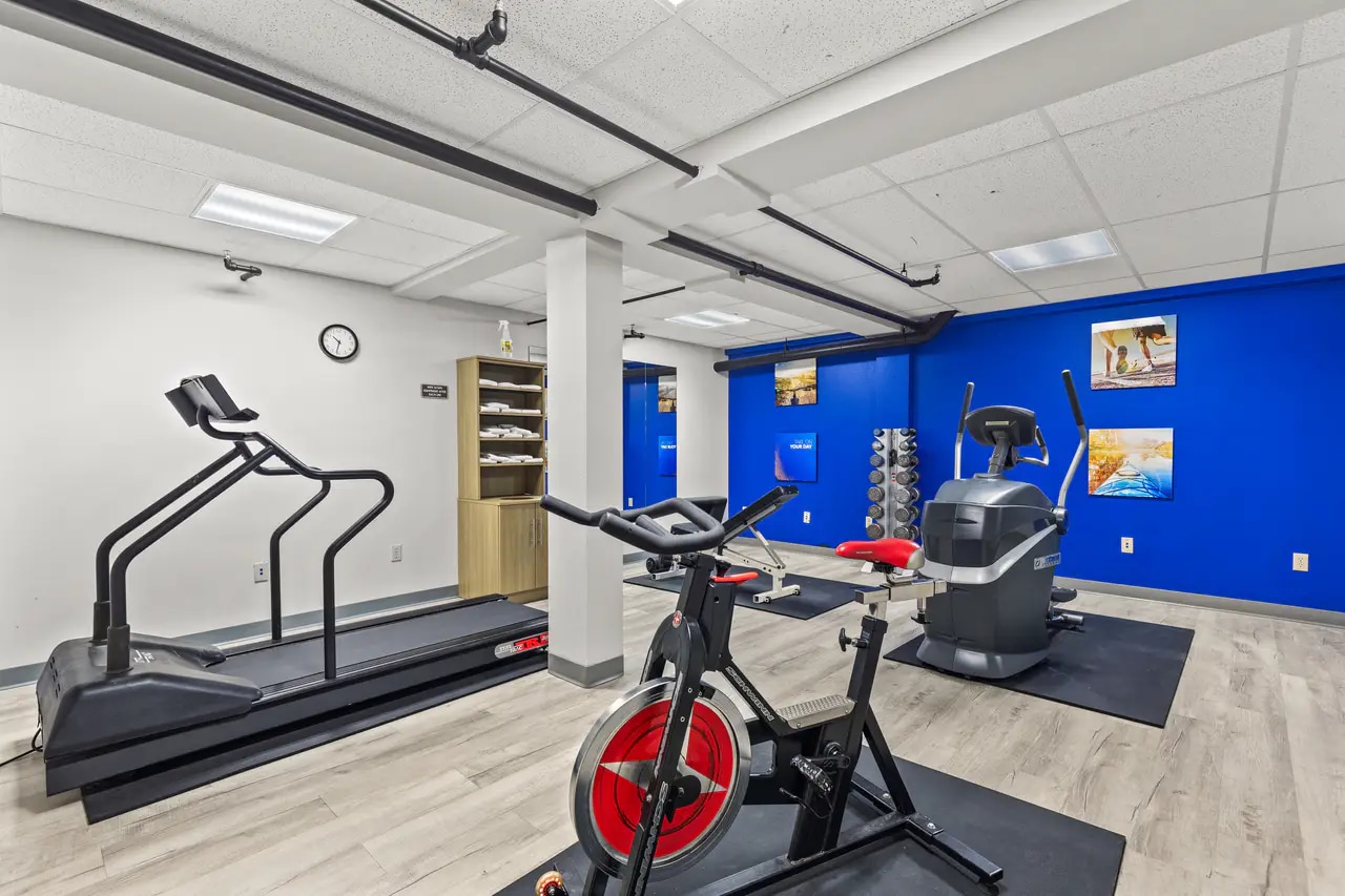 Hotel fitness room with exercise equipment
